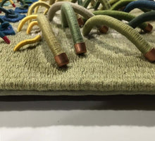 Load image into Gallery viewer, Woven textile relief sculpture detail 3, nature inspired greens and accented with greens, blues, yellows and flecks of red