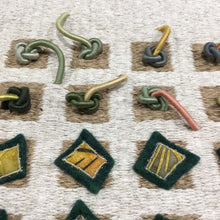 Load image into Gallery viewer, textile fiber relief sculpture detail 2, vibrant playful colors on a off white background