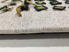 Load image into Gallery viewer, textile fiber relief sculpture detail 3, vibrant playful colors on a off white background